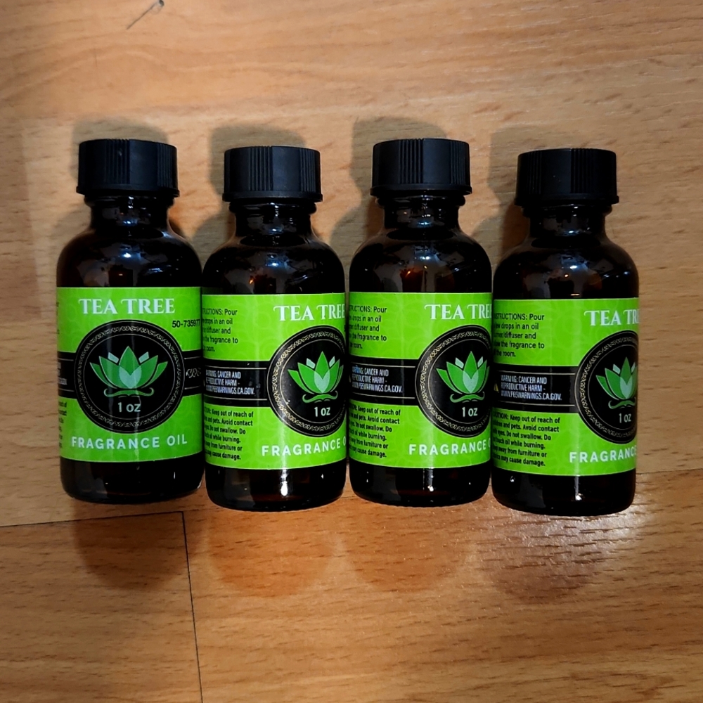 4 brand new bottles of tea tree fragrance oil